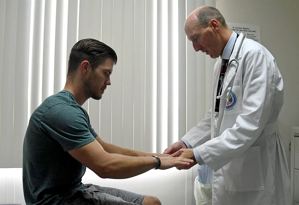 VA physician working with a veteran patient